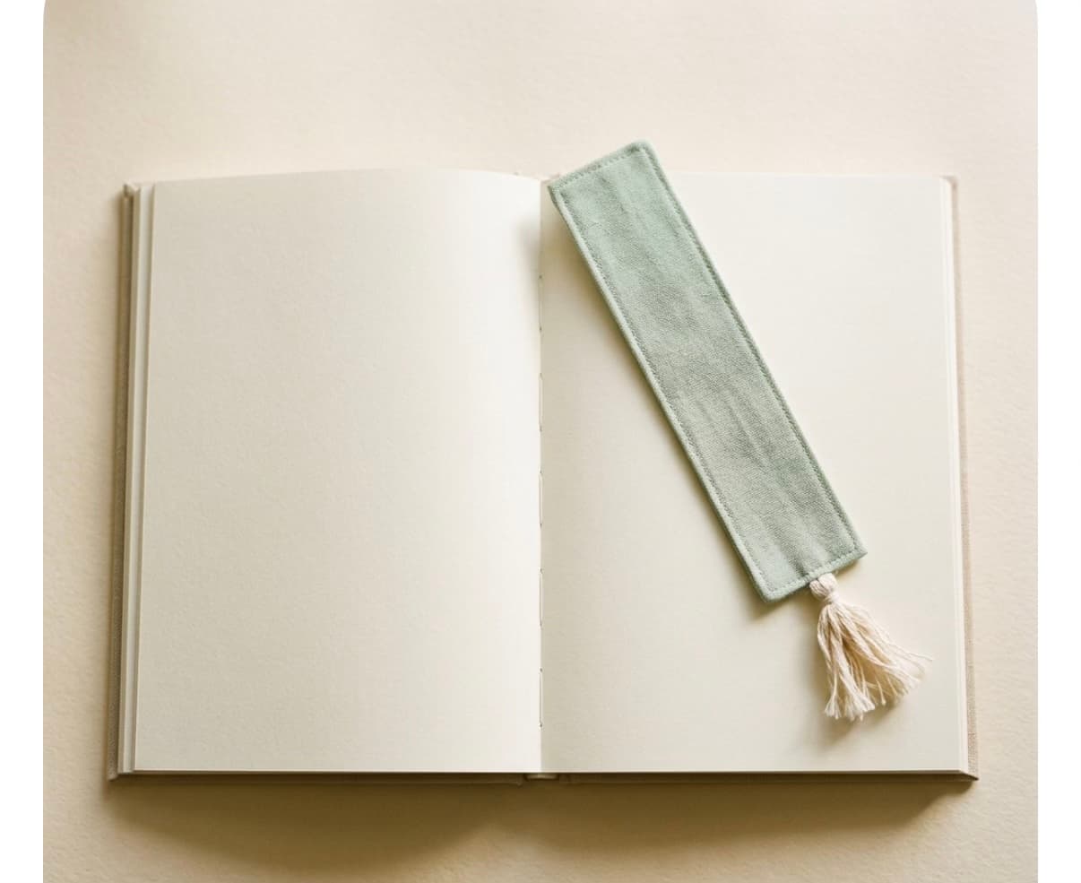 Open pages and a cloth bookmark